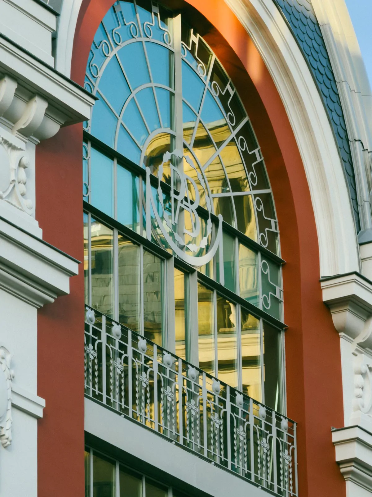 PBA emblem and stained-glass windows
